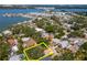 An aerial view showcasing a beautiful waterfront property near a marina, offering stunning water views at 8326 40Th N Pl, St Petersburg, FL 33709