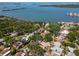 Picturesque aerial showing a waterfront neighborhood with mature trees and beautiful homes at 8326 40Th N Pl, St Petersburg, FL 33709