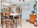Bright kitchen with a breakfast bar and adjacent dining area, ideal for casual meals and entertaining at 8326 40Th N Pl, St Petersburg, FL 33709