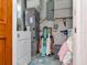 Utility room featuring a washing machine, dryer, and ample space for additional storage at 8326 40Th N Pl, St Petersburg, FL 33709