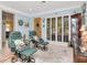 Comfortable living room with large windows, stylish furniture, and a welcoming ambiance at 8326 40Th N Pl, St Petersburg, FL 33709