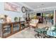Cozy living room showcasing coastal themed decor, an electric fireplace, and an open layout with bright lighting at 8326 40Th N Pl, St Petersburg, FL 33709