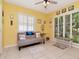 Bright living room with white plantation shutters and view of the backyard at 8326 40Th N Pl, St Petersburg, FL 33709