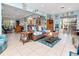 Open living room featuring coastal decor, comfortable furniture, and a layout ideal for entertaining at 8326 40Th N Pl, St Petersburg, FL 33709