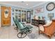 Inviting living room with cozy seating, natural light, and charming decor at 8326 40Th N Pl, St Petersburg, FL 33709