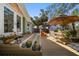 A spacious deck leads to outdoor seating, offering ample room for relaxing and entertaining guests at 8403 W Gulf Blvd, Treasure Island, FL 33706