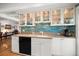 Bright kitchen featuring granite counters, stainless appliances, and under cabinet lighting at 8403 W Gulf Blvd, Treasure Island, FL 33706