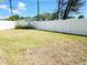 Spacious backyard with a privacy fence, perfect for outdoor entertaining and relaxation at 8719 Sunlit Cove Ne Dr, St Petersburg, FL 33702
