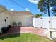 Cozy backyard with a patio area, perfect for outdoor dining and lounging at 8719 Sunlit Cove Ne Dr, St Petersburg, FL 33702