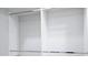 Spacious closet featuring built in storage and organization system with hanging rods at 8719 Sunlit Cove Ne Dr, St Petersburg, FL 33702