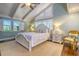 Cozy bedroom features bright natural light, and a comfortable atmosphere at 898 Cypress Lakeview Ct, Tarpon Springs, FL 34688