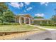Beautiful front exterior of a single-story home at 898 Cypress Lakeview Ct, Tarpon Springs, FL 34688