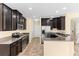 Modern kitchen featuring stainless steel appliances and granite countertops at 9908 Spice Bush Ct, Tampa, FL 33647