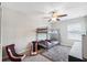 Bedroom featuring a bunk bed, perfect for , and includes essential furnishings for a comfortable space at 10687 Lake Montauk Dr, Riverview, FL 33578