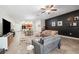 Open floor plan blending the living room, dining area, and kitchen for easy entertaining and Gathering time at 10687 Lake Montauk Dr, Riverview, FL 33578