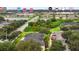 Aerial view of a home near restaurants, shops, and green spaces, indicating convenient access to amenities and services at 10807 Keys Gate Dr, Riverview, FL 33579