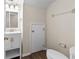 Cozy bathroom featuring a white vanity, toilet, and neutral walls at 10807 Keys Gate Dr, Riverview, FL 33579