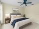 Bedroom design featuring neutral walls, a ceiling fan, with a window and natural light at 10807 Keys Gate Dr, Riverview, FL 33579