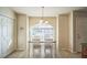 Cozy dining room with natural light and a view of the neighborhood at 10841 Standing Stone Dr, Wimauma, FL 33598