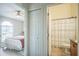 Hallway view of bedroom and bathroom featuring doorways and closet at 10841 Standing Stone Dr, Wimauma, FL 33598