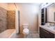 Bathroom with a tub and shower combination, featuring updated tile work and modern vanity at 11209 Kangley Ln, Spring Hill, FL 34608