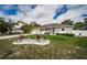 Well-kept home with manicured lawn, highlighting its inviting curb appeal and tranquil outdoor space at 11209 Kangley Ln, Spring Hill, FL 34608