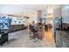 Spacious open floor plan seamlessly connects the living room to a modern kitchen at 11209 Kangley Ln, Spring Hill, FL 34608
