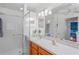 Clean bathroom featuring a glass-enclosed shower and a white countertop at 11250 Hollander Ave, Hudson, FL 34667