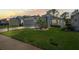 Exterior shot of the home at dusk, showcasing the well-manicured lawn and tasteful landscaping at 11250 Hollander Ave, Hudson, FL 34667