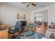 Comfortable home office showcasing a view into the dining room at 11250 Hollander Ave, Hudson, FL 34667