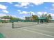 Well-maintained tennis court for active residents, perfect for friendly matches and recreational activities at 11250 Hollander Ave, Hudson, FL 34667