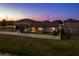 Aerial view of a home with a pristine white fence and cozy back patio nestled in a friendly neighborhood at 11407 Acacia Grove Ln, Riverview, FL 33579