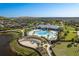An aerial of the pool and recreational center, offering leisure and community engagement at 11407 Acacia Grove Ln, Riverview, FL 33579