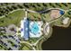 Aerial view showcasing community amenities including a pool, playground, and beautifully landscaped grounds at 11407 Acacia Grove Ln, Riverview, FL 33579