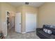 Bonus room with closet and adjacent access to other rooms in the house at 11407 Acacia Grove Ln, Riverview, FL 33579