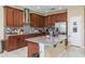 Well-equipped kitchen featuring stainless steel appliances, granite countertops, and ample cabinet space at 11407 Acacia Grove Ln, Riverview, FL 33579