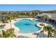 Expansive pool area with palm trees, sun loungers, and a clubhouse overlooking the serene water at 11407 Acacia Grove Ln, Riverview, FL 33579