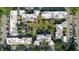 Aerial view of the condo community showcasing spacious green areas and ample parking at 14419 Americana Cir # 103, Tampa, FL 33613