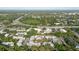 Wide aerial shot of condo community offering a look at location and surrounding landscape at 14419 Americana Cir # 103, Tampa, FL 33613