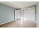 Comfortable bedroom featuring tile floors, closet, and neutral walls at 14419 Americana Cir # 103, Tampa, FL 33613