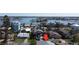 Aerial view showcasing the home's location near the waterway and surrounding neighborhood at 16204 3Rd E St, Redington Beach, FL 33708