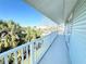 Outdoor balcony with scenic views surrounded by tropical foliage at 16204 3Rd E St, Redington Beach, FL 33708