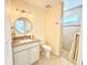 Modern bathroom with vanity, toilet, shower, and stylish fixtures at 16204 3Rd E St, Redington Beach, FL 33708