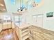 Open-concept kitchen with island, stainless steel appliances, and a breakfast nook at 16204 3Rd E St, Redington Beach, FL 33708