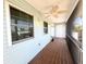 Relaxing screened-in porch with ample natural light and room for outdoor furniture at 16204 3Rd E St, Redington Beach, FL 33708