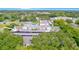 Aerial view featuring community buildings and landscaping with parking at 1655 S Highland Ave # F126, Clearwater, FL 33756