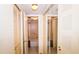 Shared bathroom featuring a tub with a shower and mirrored closet doors at 1655 S Highland Ave # F126, Clearwater, FL 33756