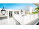 Charming condo featuring a well-maintained exterior, white picket fence and lovely landscaping at 1655 S Highland Ave # F126, Clearwater, FL 33756