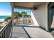 This balcony offers beautiful views of the beach, palm trees and water at 1660 Gulf Blvd # Ph-7, Clearwater Beach, FL 33767