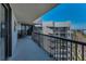 Spacious condo balcony with black metal railings and patio furniture at 1660 Gulf Blvd # Ph-7, Clearwater Beach, FL 33767